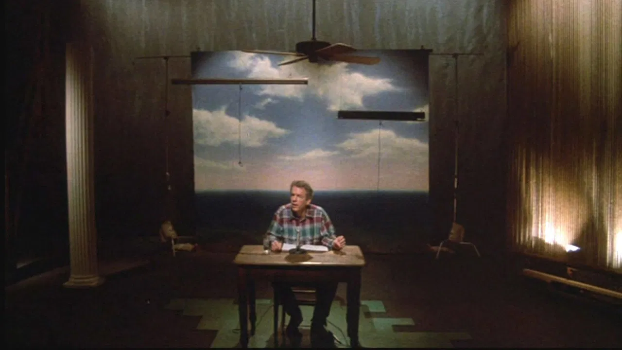 Swimming to Cambodia backdrop