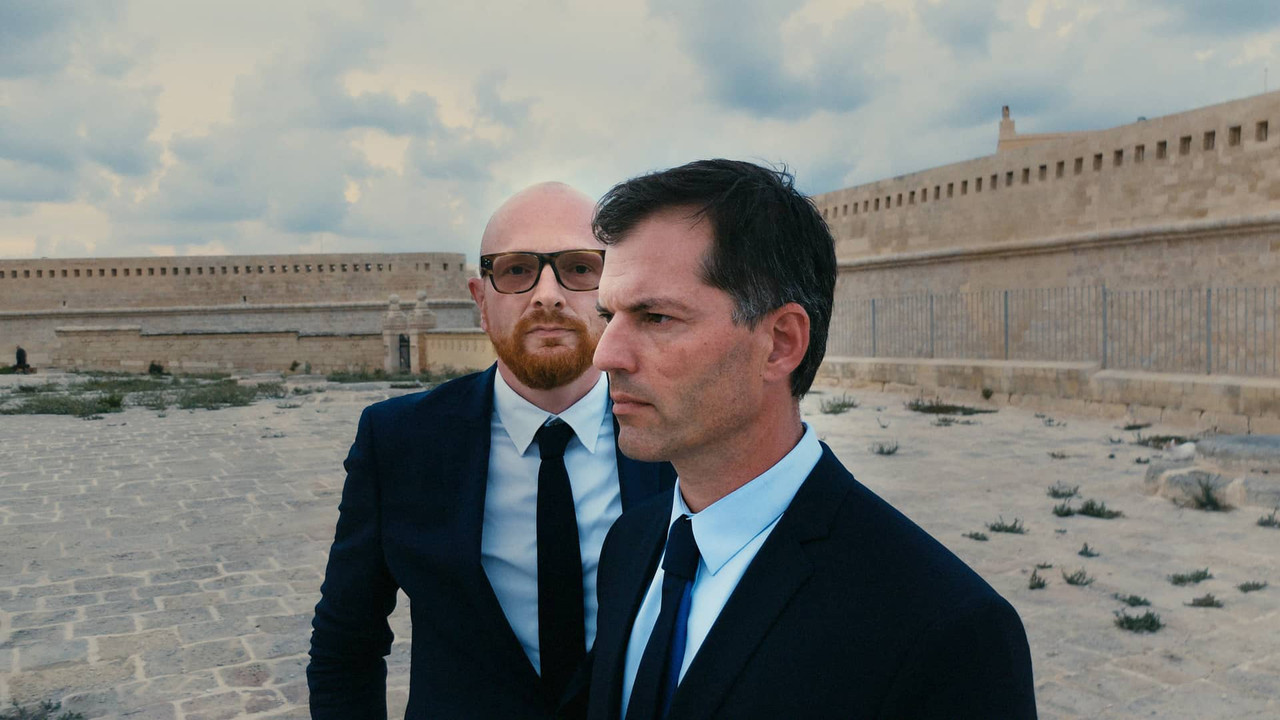 The John Dalli Mystery backdrop