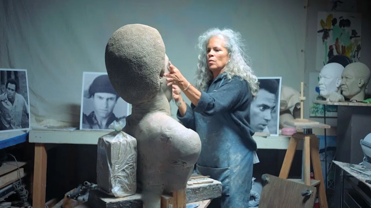 Alive in Bronze backdrop