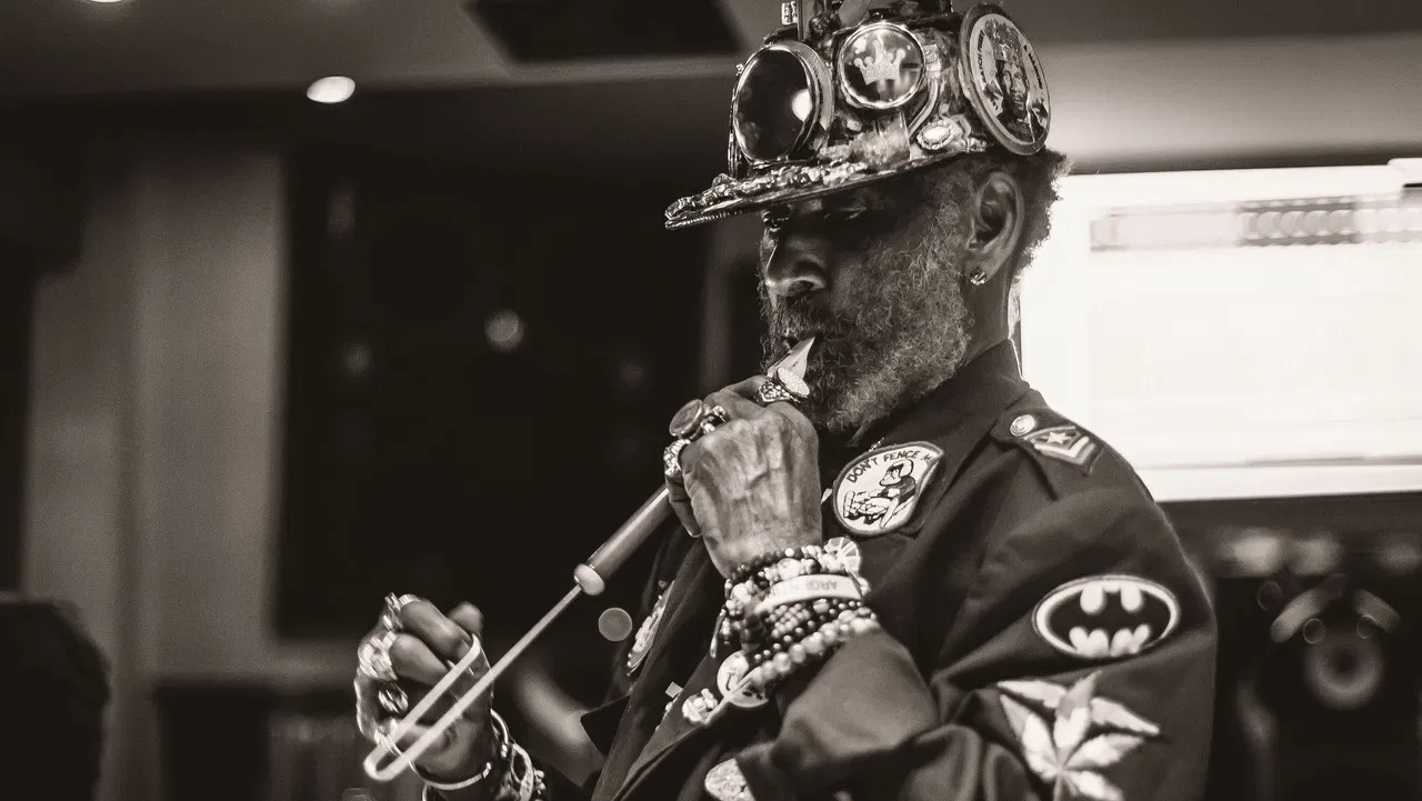 Lee Scratch Perry at the Jazz Café backdrop