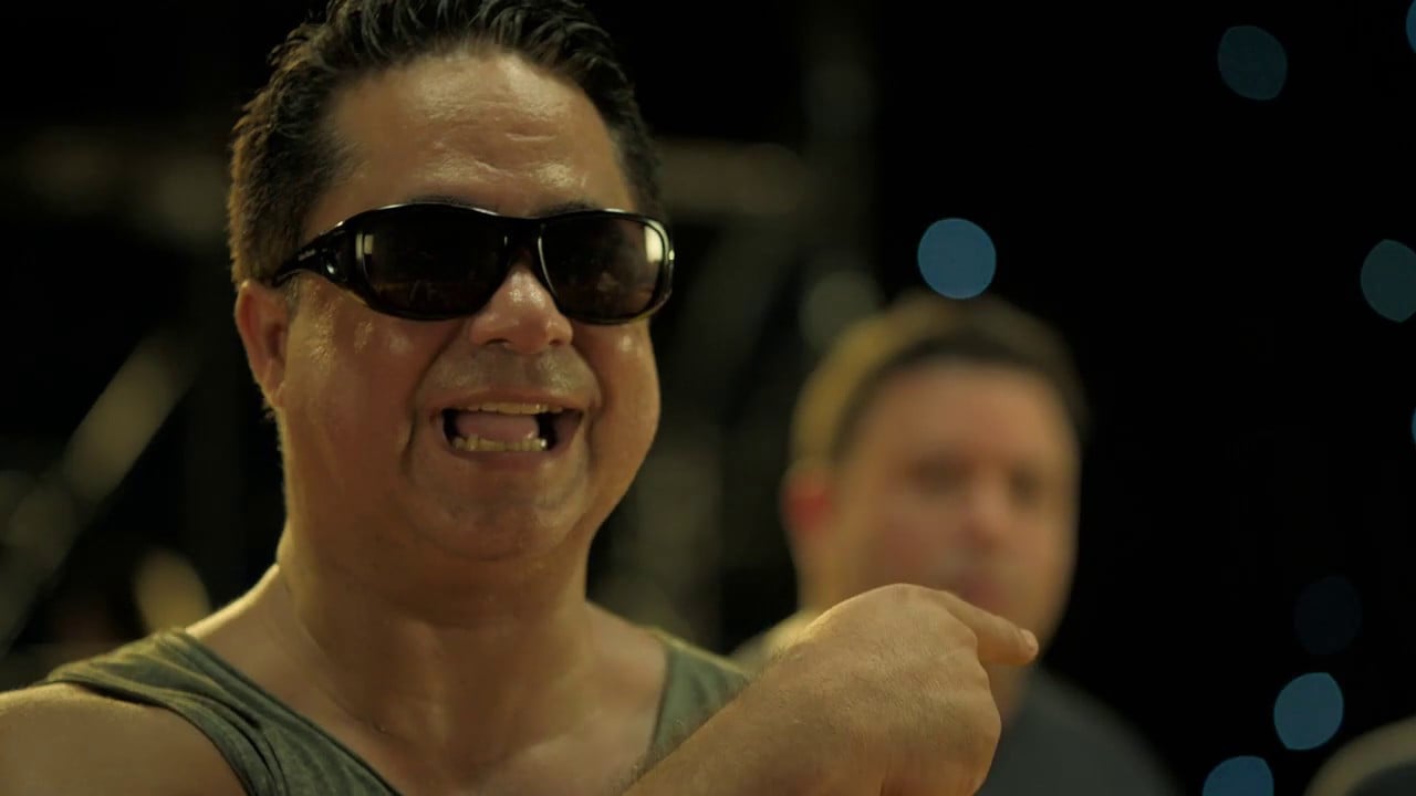 Los Domirriqueños 2 backdrop