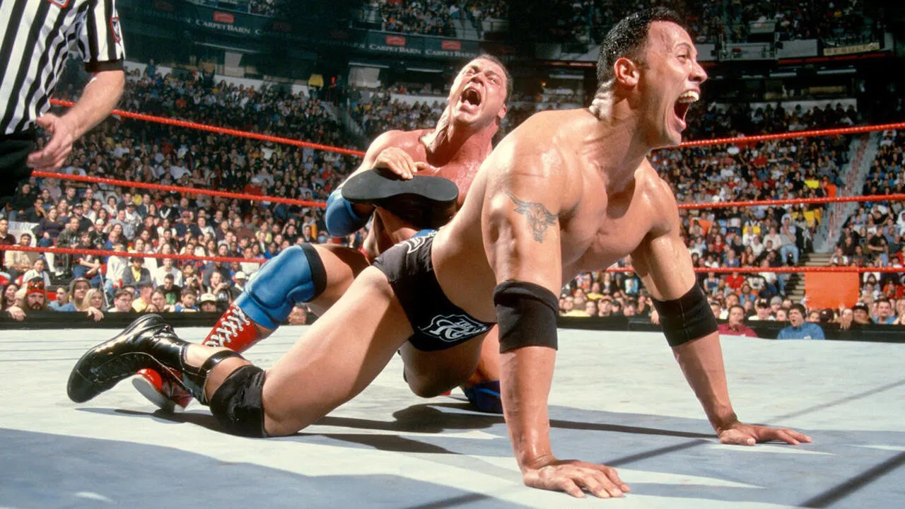 WWE: The 50 Greatest Finishing Moves in WWE History backdrop