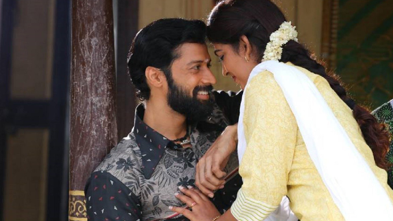 Irumbu Manithan backdrop