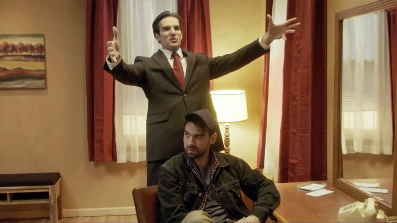 Gun and a Hotel Bible backdrop