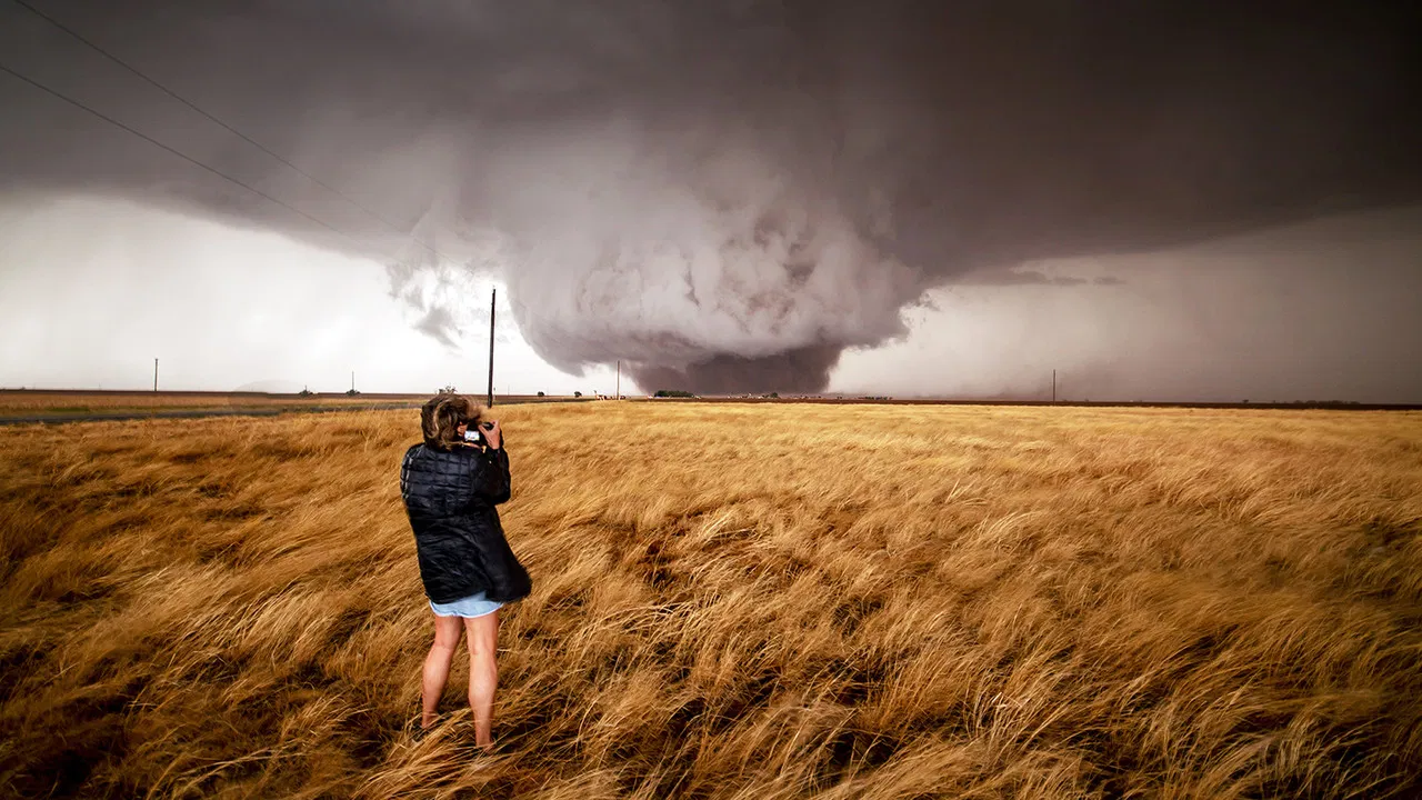 The Chasers of Tornado Alley: Touching the Sky backdrop