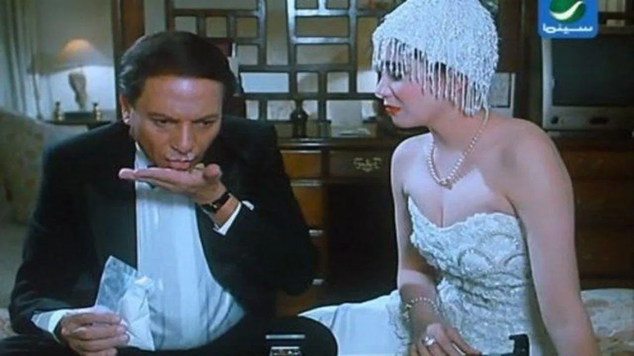 Bakhit and Adeela backdrop