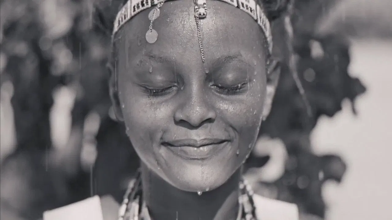 Water is Life: The Maasai Story or Waiting for the Rain backdrop