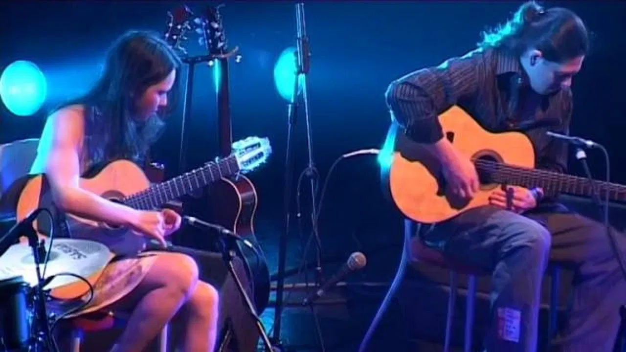 Rodrigo y Gabriela: Other Voices, Songs from a Room backdrop