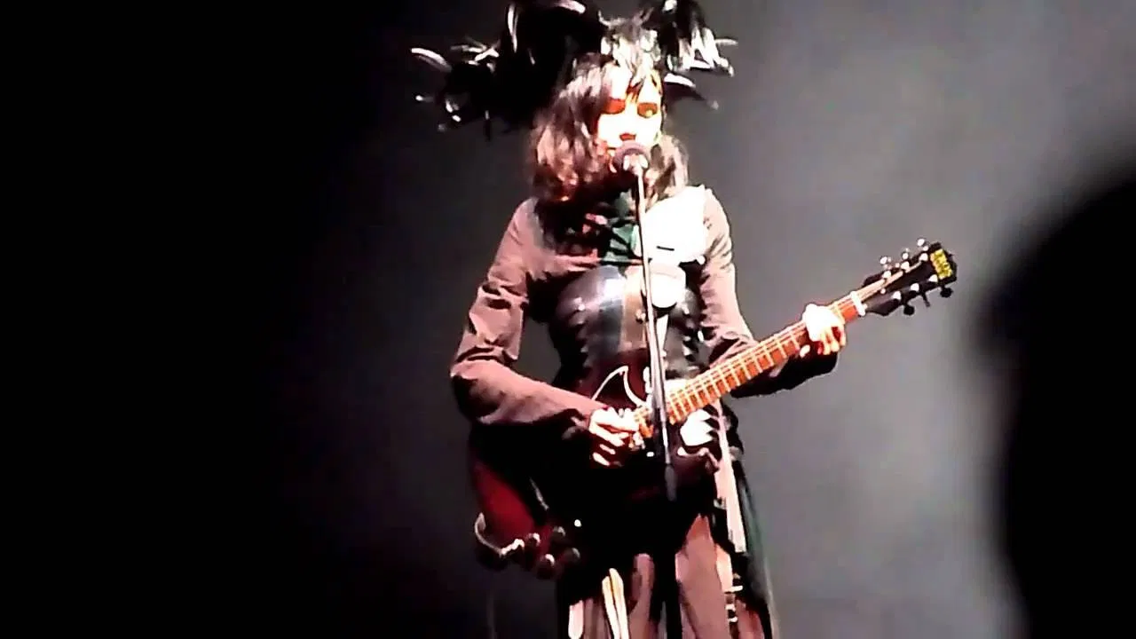 PJ Harvey in Concert - Paris 2011 backdrop