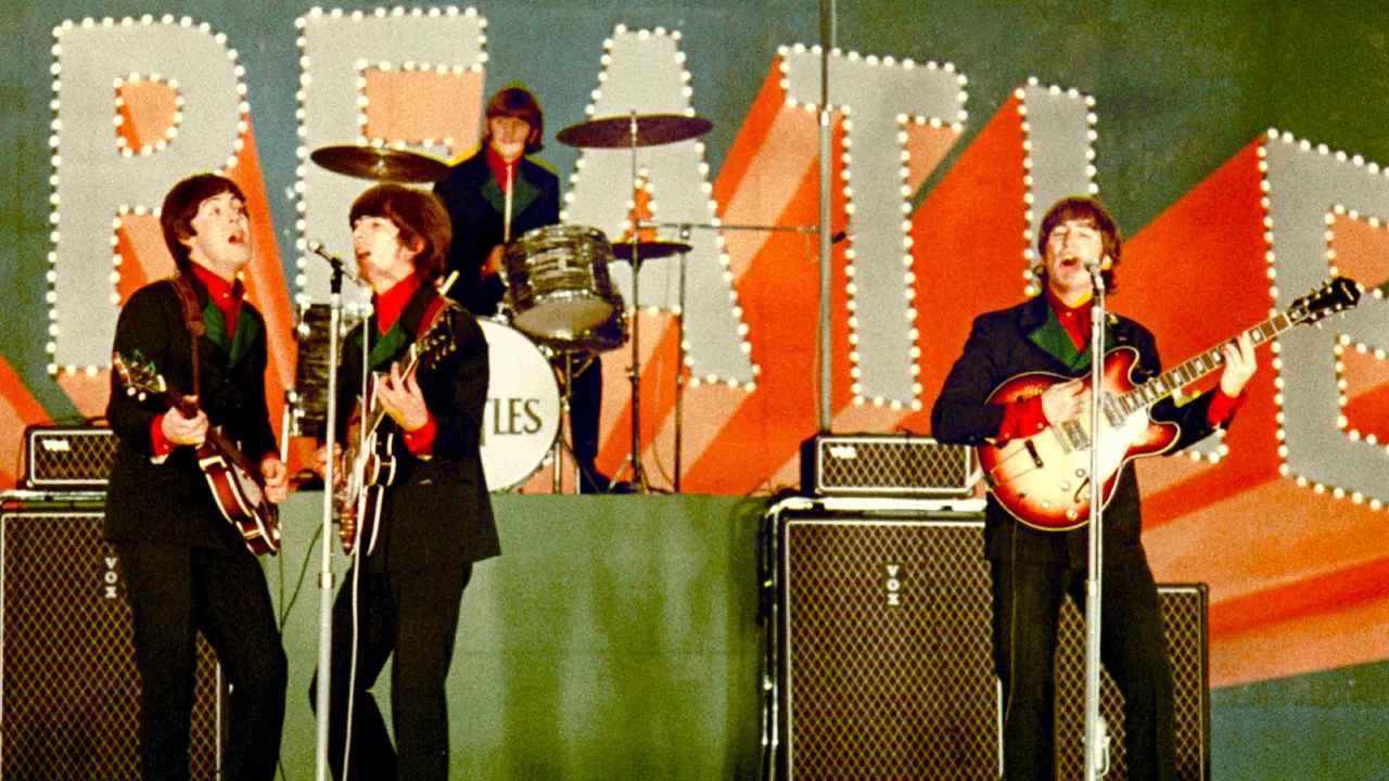 The Beatles: Around the World backdrop