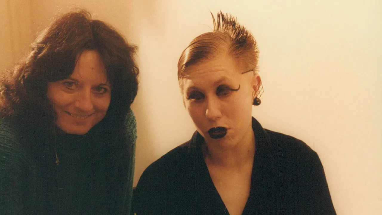 Not a Man, not a Woman, just a Raven backdrop