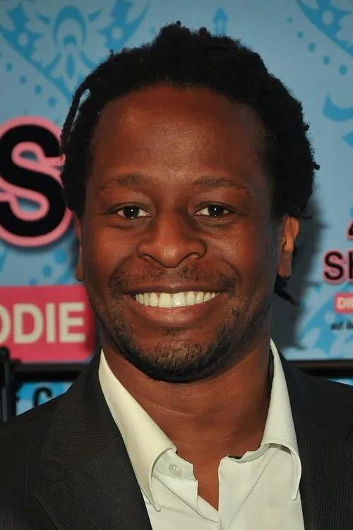 Mola Adebisi profile