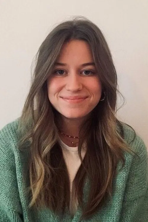 Emmylou De Caster profile