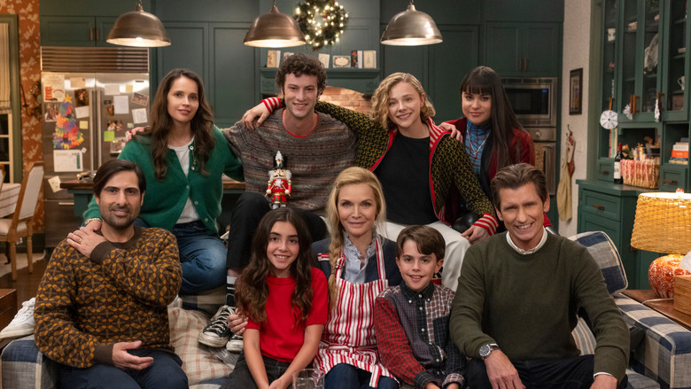 Claire holding a candle, looking resolute