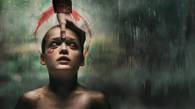 Sally Hawkins as Laura standing in a shadowy hallway