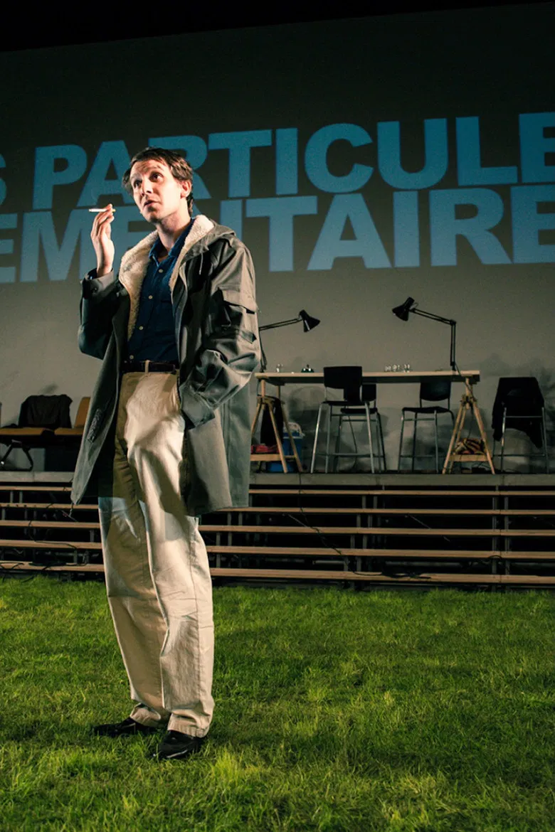 Les particules élémentaires poster background